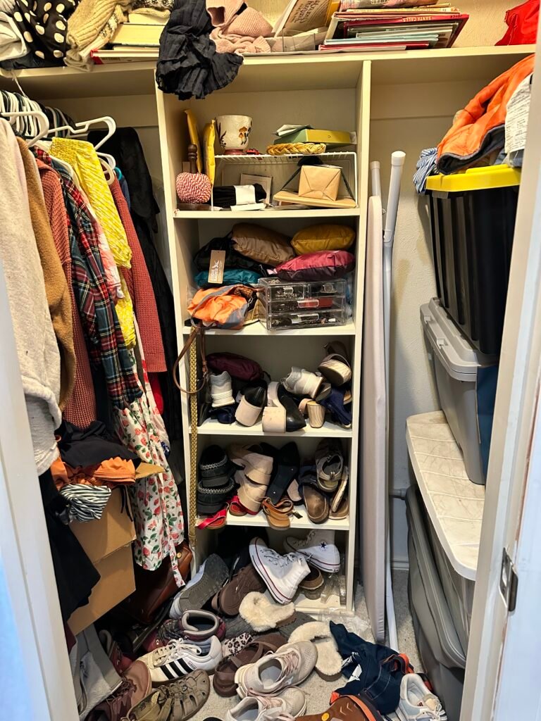 overstuffed closet of an in-person decluttering coaching session