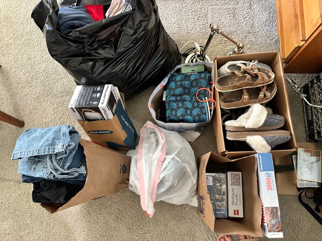 Pile of items decluttered from an in-person decluttering session.